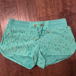 Matte green lace shorts